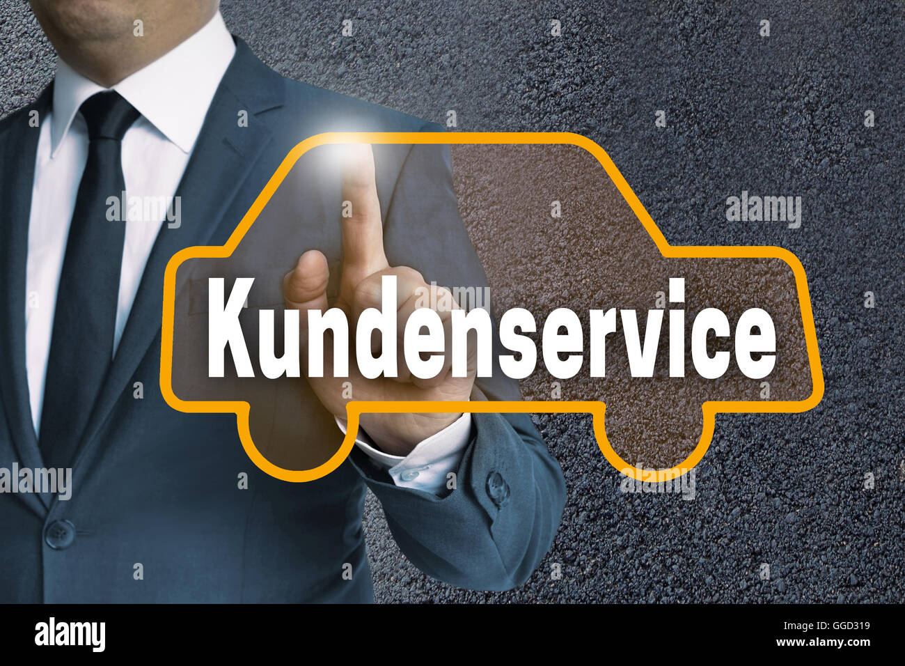 Kundenservice (in german Customer Care) car touchscreen is operated by businessman concept. Stock Photo