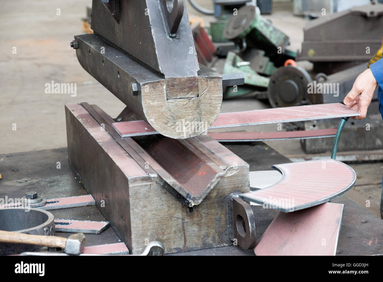 Metal bending machine in a ship repair dock Stock Photo