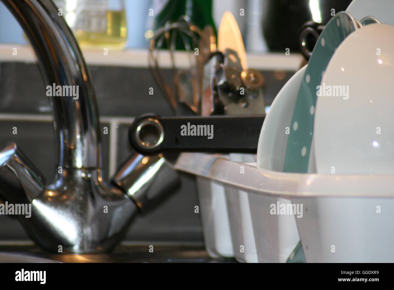 Draining board with washing up Stock Photo Alamy