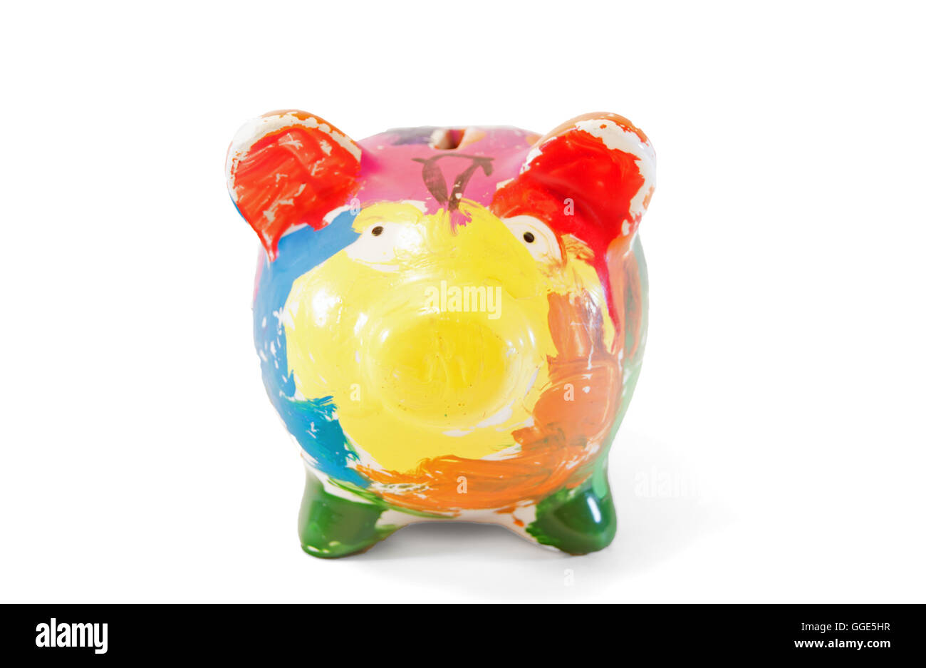 A multi colored piggy bank on a white background Stock Photo - Alamy