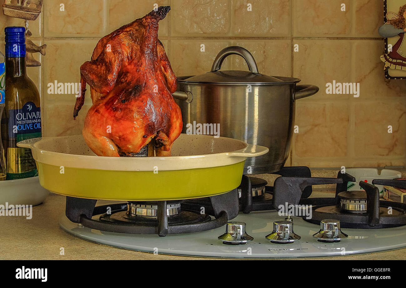 A whole chicken cooked on the grill Stock Photo Alamy