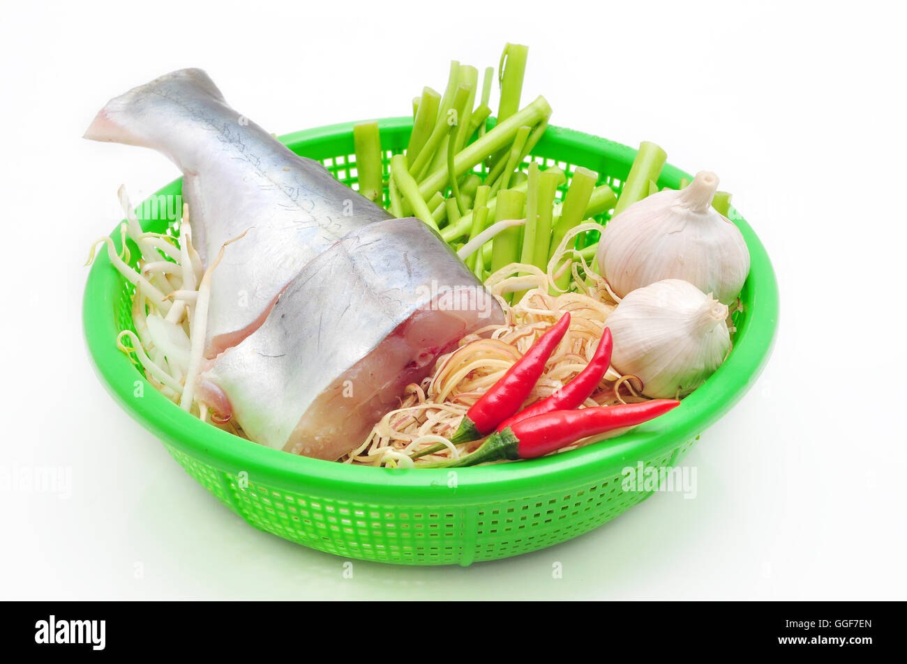 Pangasius or Vietnamese catfish in the kitchen in a white background