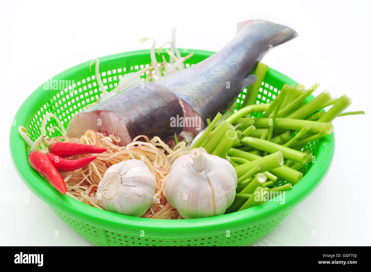 Pangasius or Vietnamese catfish in the kitchen in a white background
