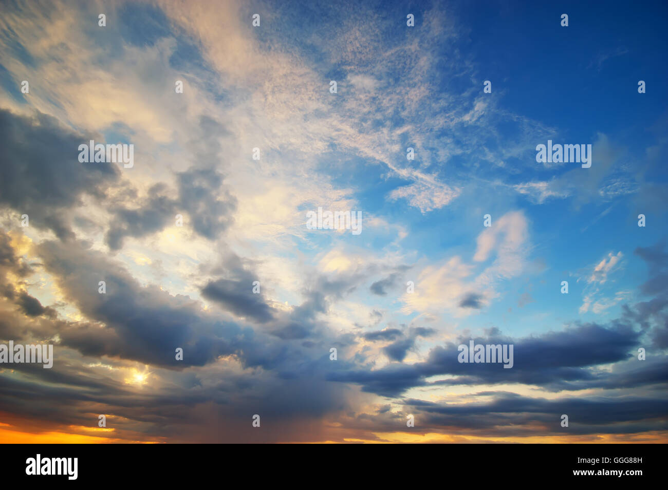 Beautiful sunset sunrise with clouds. Heavenly sunset texture Stock Photo