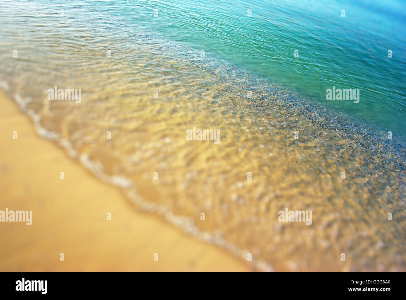 Wave on shore defocused background. Element of design Stock Photo