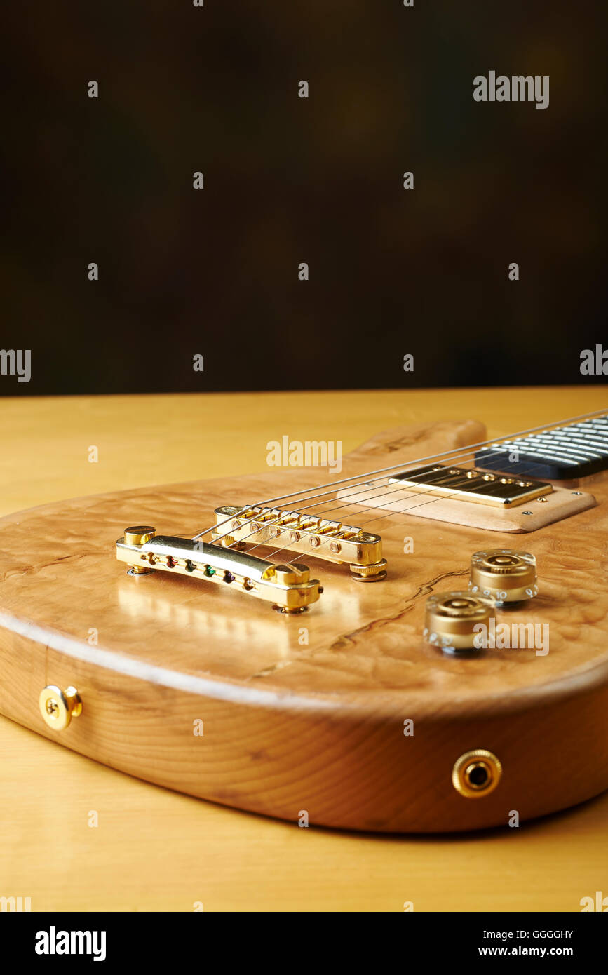 guitar-wooden-natural-color-with-golden-accessories-stock-photo-alamy