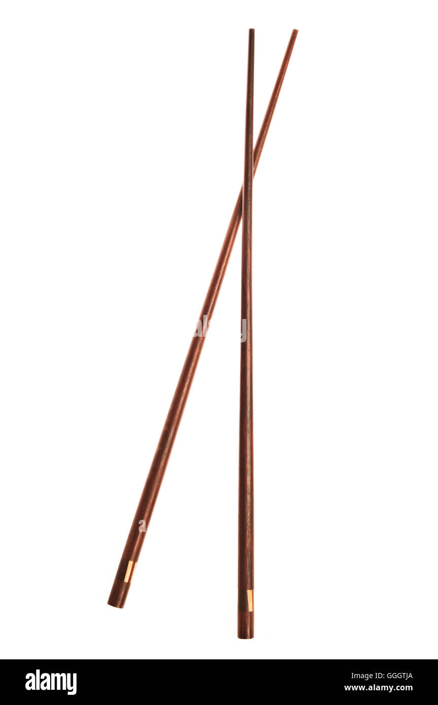 pair of chopsticks over white background Stock Photo