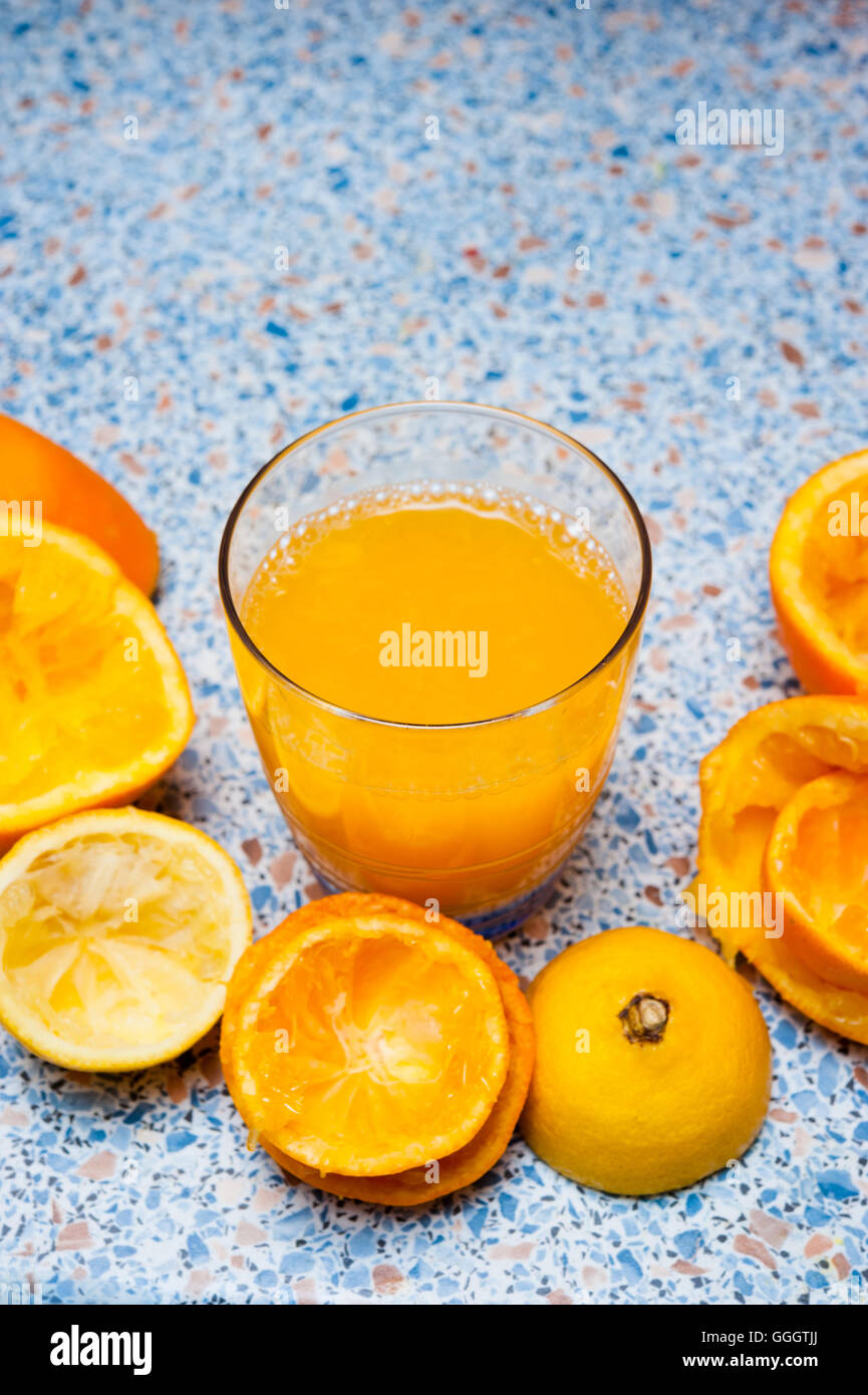 oranges and lemons peels and orange juice in glass Stock Photo Alamy