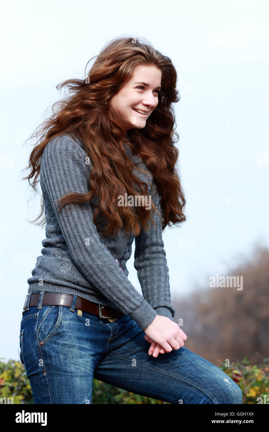 Portrait of a happy young woman Stock Photo - Alamy