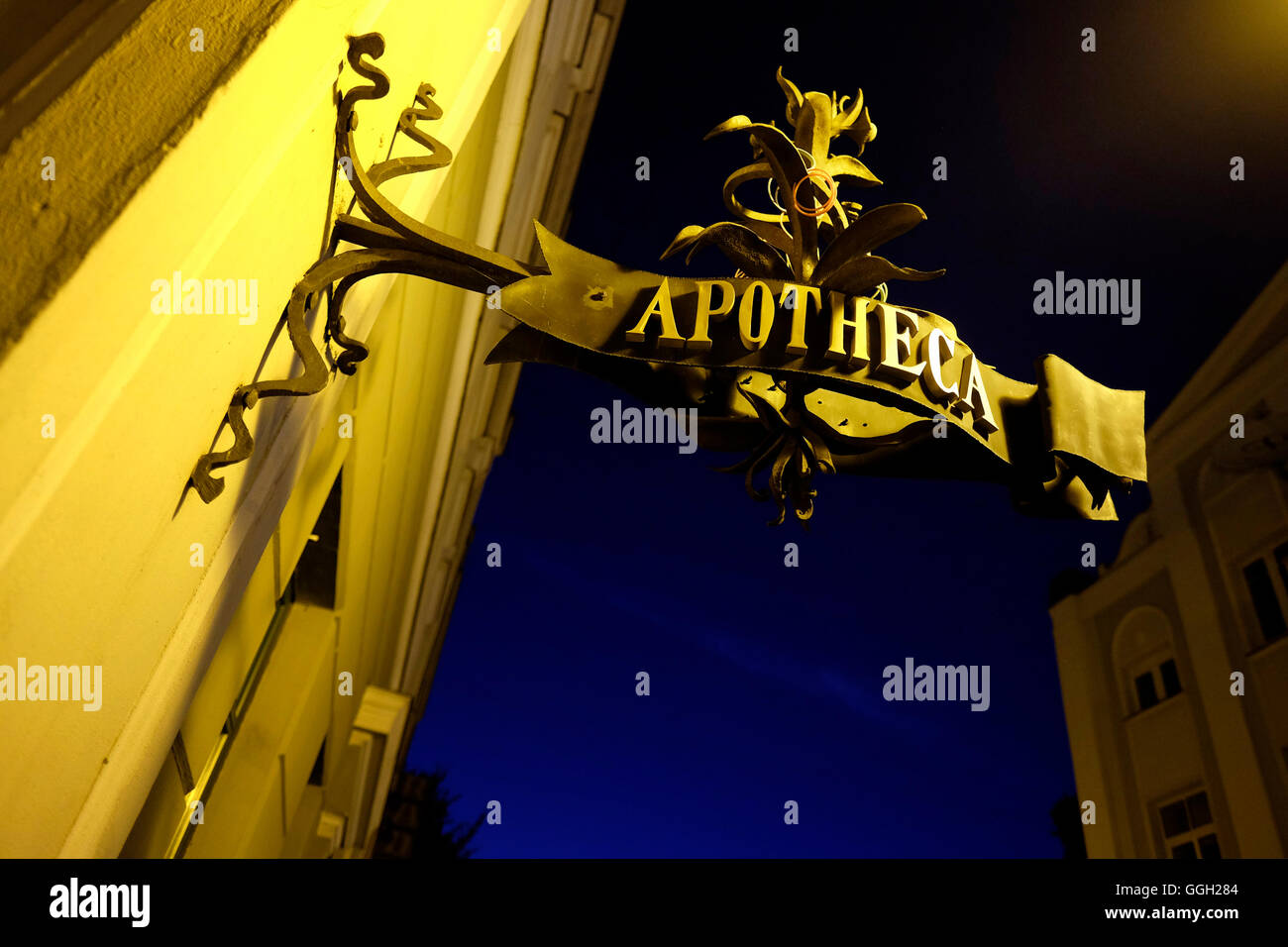 Medieval wrought iron shop sign of a pharmacy in the old town of Klaipeda in Lithuania Stock Photo