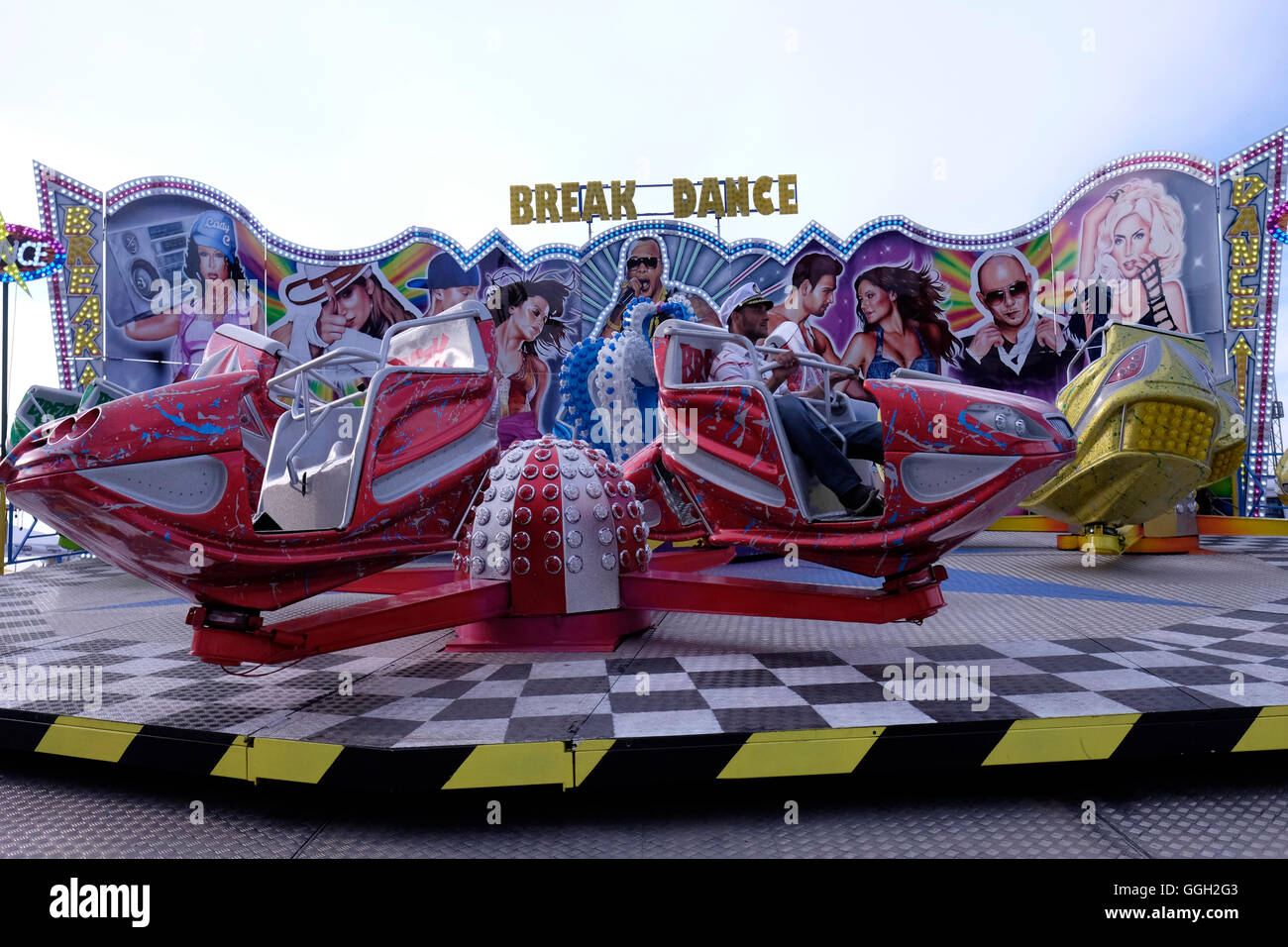 A lithuanian man spinning at a funfair ride at a children's amusement ...
