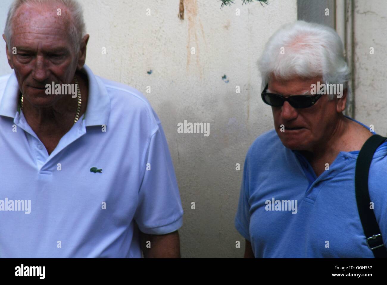 Two elderly men stood together, old friends, old men, pensioners, Stock Photo