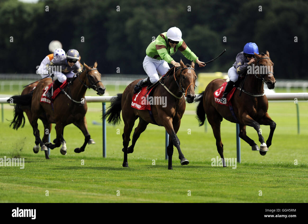 I Am Not Here and Emma Sayer (centre) win the Betfred Haydock Park Ladies Trophy Race during Betfred Rose Of Lancaster Stakes Ladies Day at Haydock Park Racecourse. Stock Photo