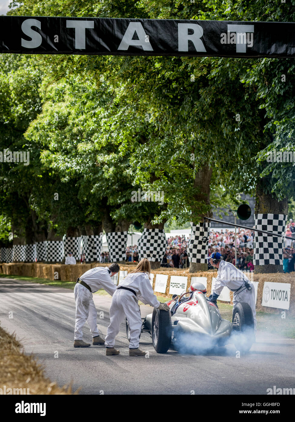 Sir Jackie Stewart in Mercedes Benz W165 at the start, Goodwood Festival of Speed 2014, racing, car racing, classic car, Chiches Stock Photo