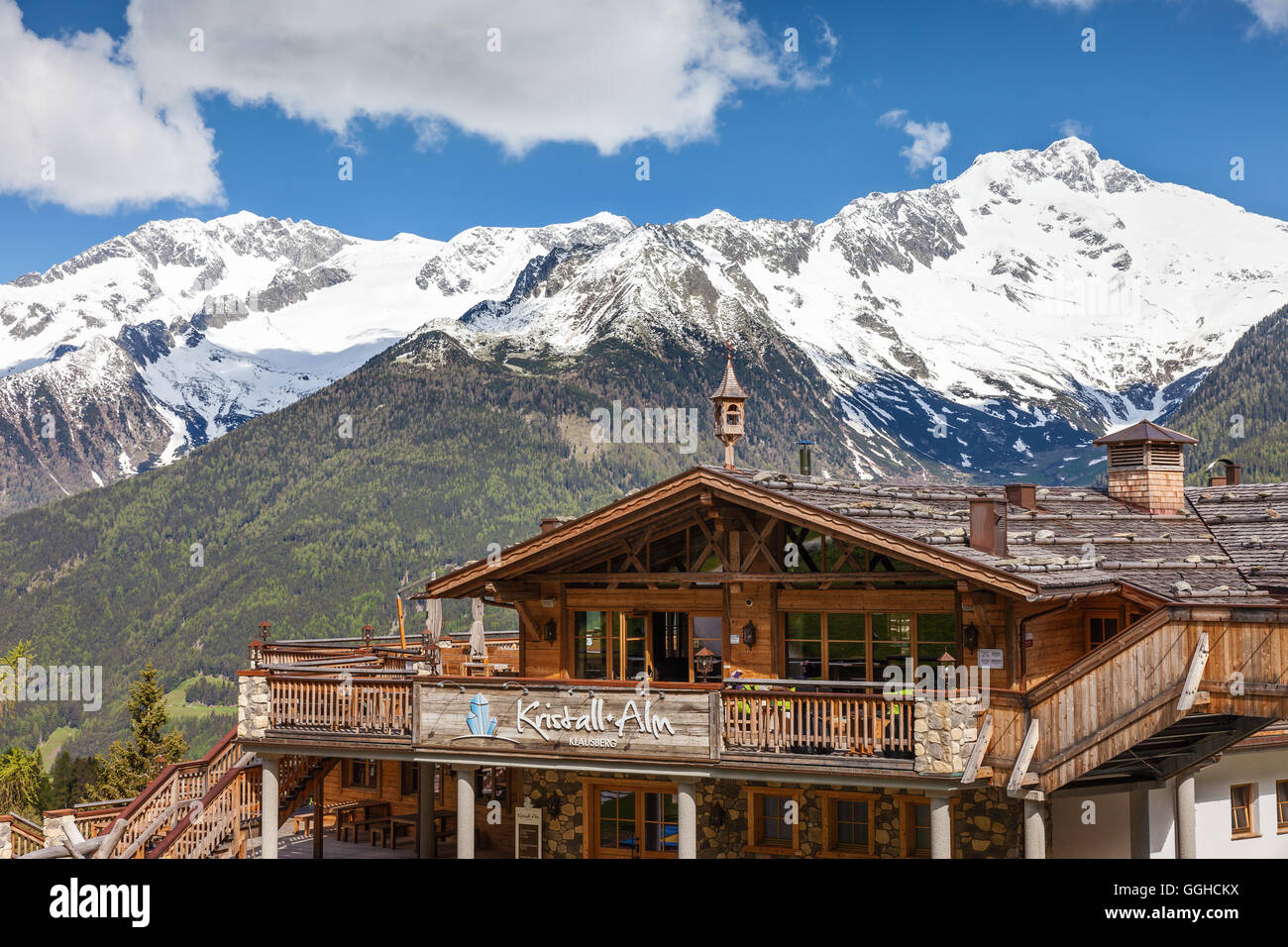 geography / travel, Italy, South Tyrol, mountain cabin and snow covered mounts on the Klausberg near stone house, Ahrntal (Ahrn Valley) , Freedom-Of-Panorama Stock Photo