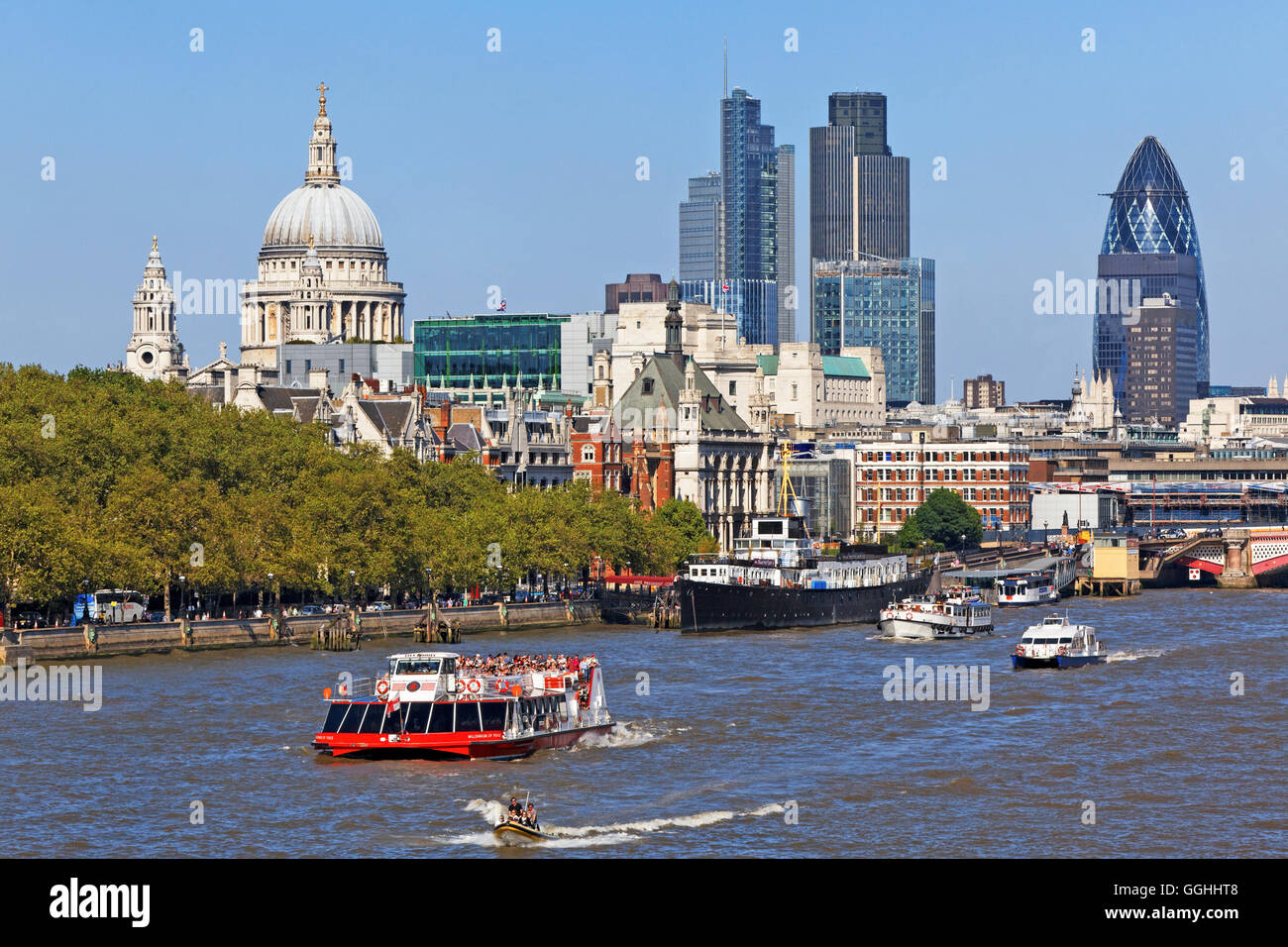 View over the Thames to St. Paul's Cathedral and the office highrisers of the City, London, England, United Kingdom Stock Photo