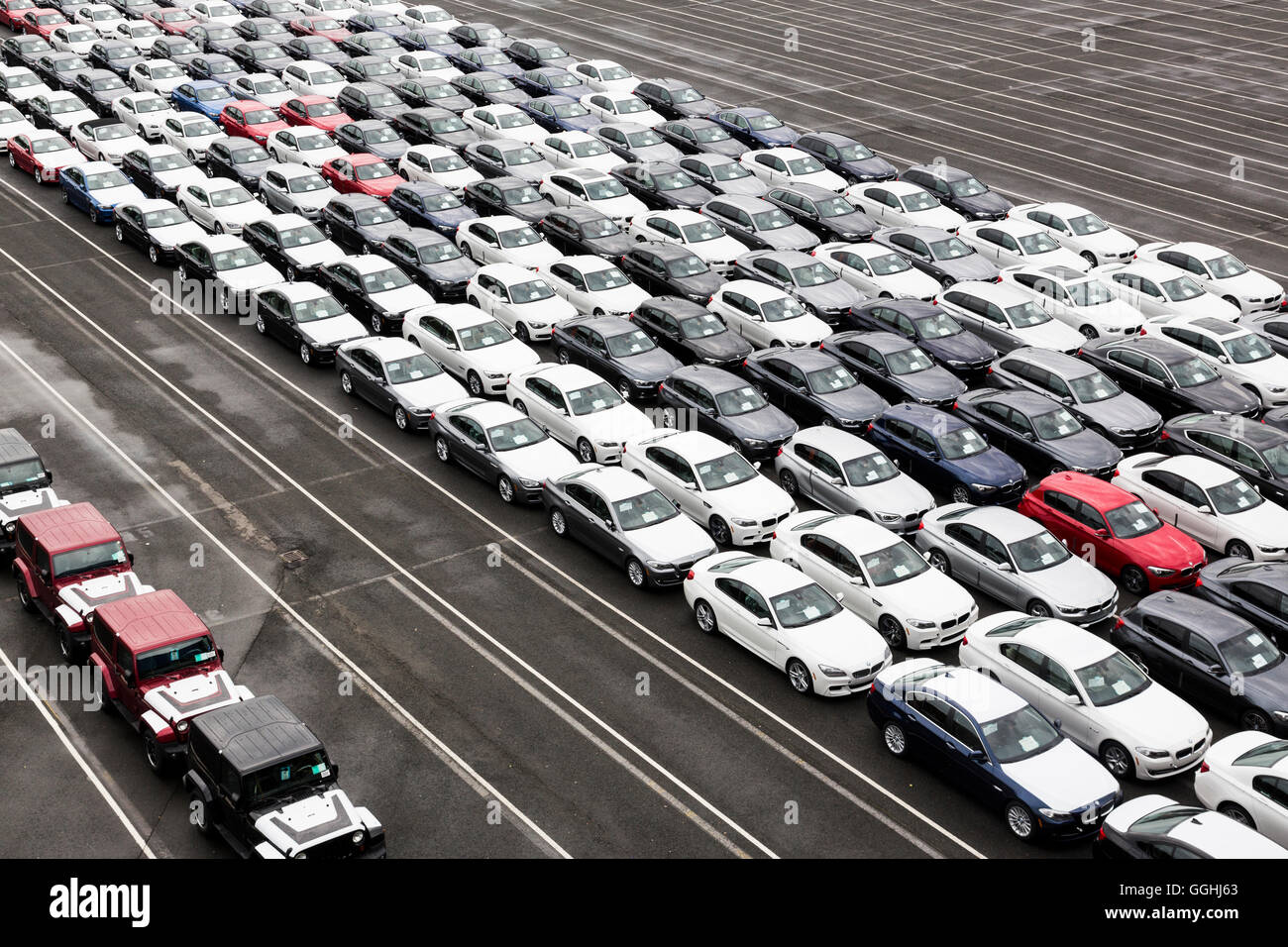 New cars on a parking area awaiting shipping in Bremerhaven, Bremen, Germany Stock Photo