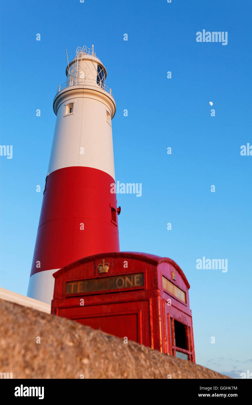 Portland Bill Lighthouse and typical red phone booth, Weymouth, Portland, Dorset, England, Great Britain Stock Photo
