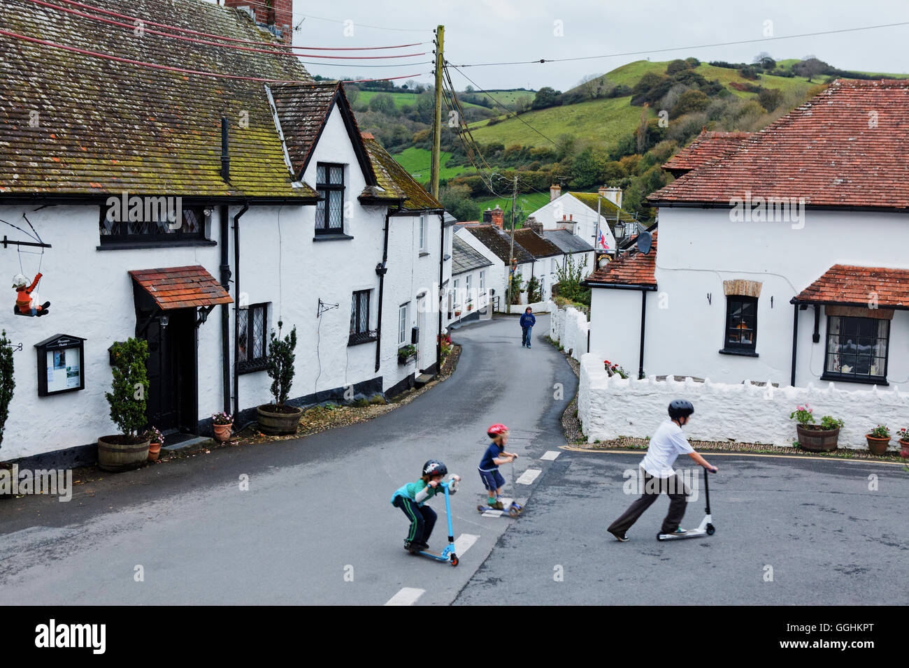 Berrynarbor village with children playing, Devon, England, Great Britain Stock Photo
