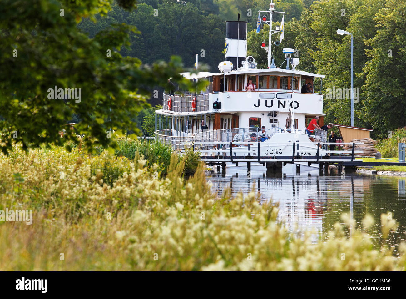 Historic canal boat Juno in a lock, Gota canal, Norrkoeping, Sweden Stock Photo