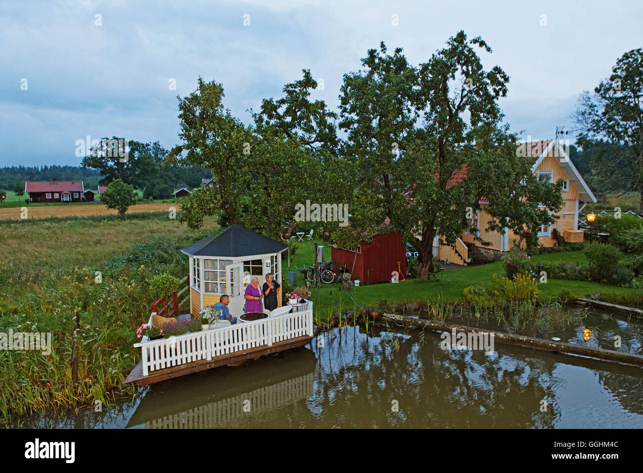 Terrace for a perfect sundowner, Gota canal, Sjoetorp, Sweden Stock Photo