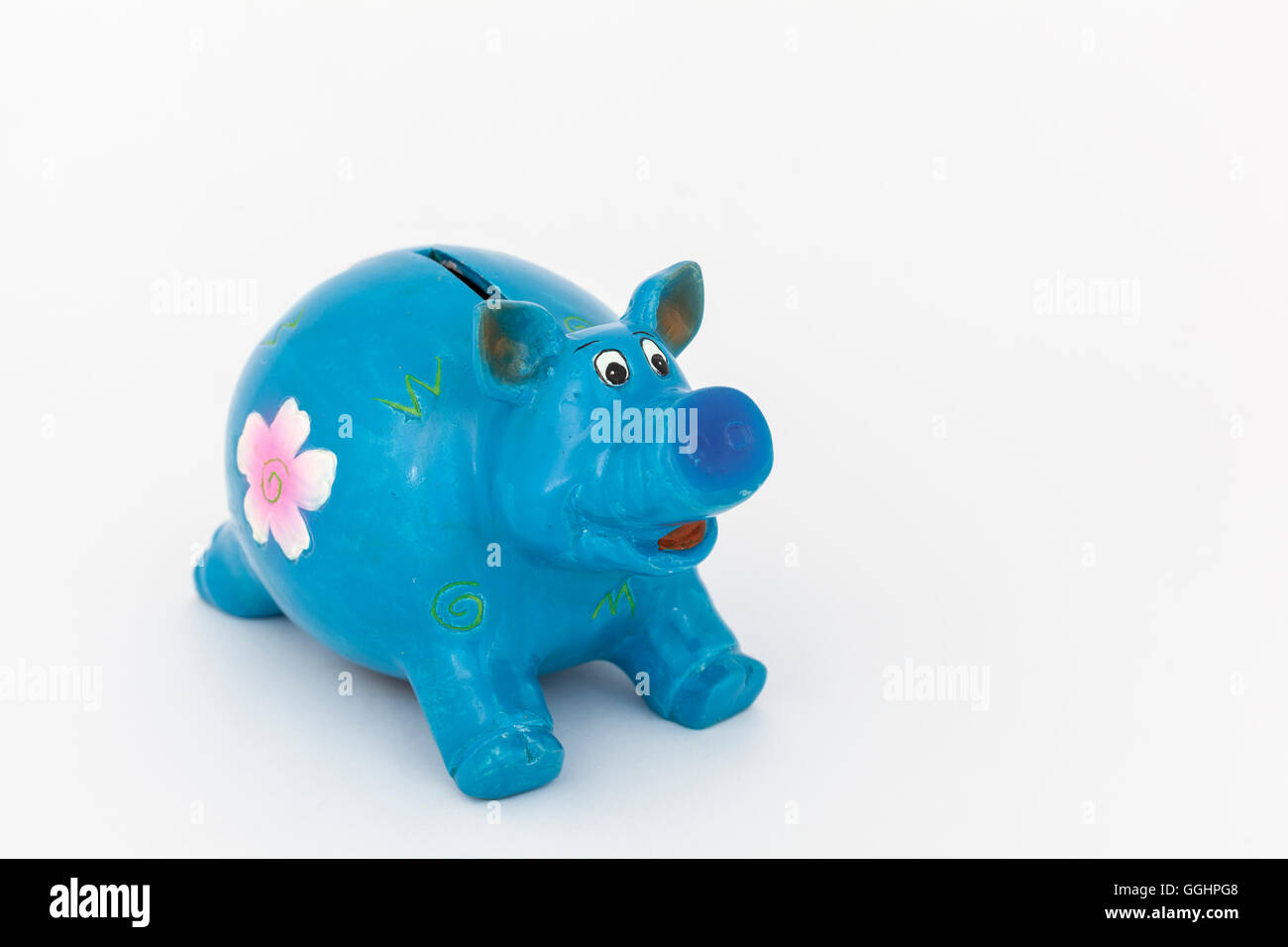 blue piggy bank with white background Stock Photo - Alamy