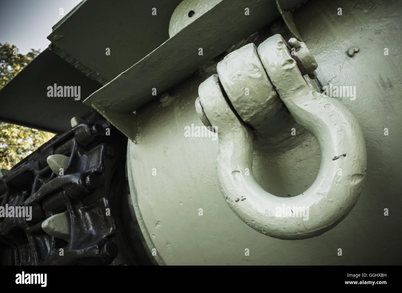 Green tank fragment. Closeup photo, heavy industry details Stock Photo