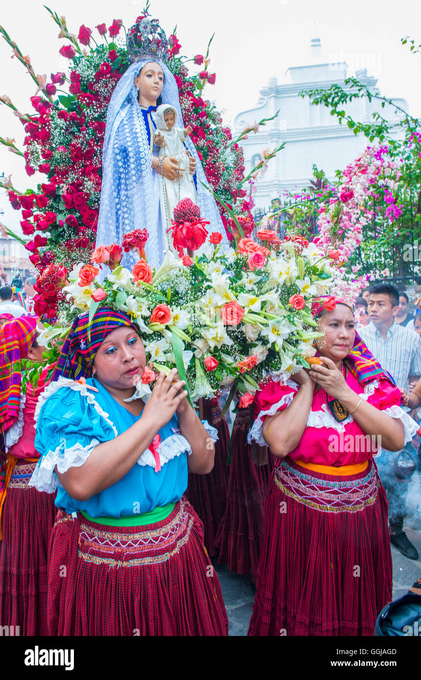 Salvadorian people participate in the procession of the Flower & Palm