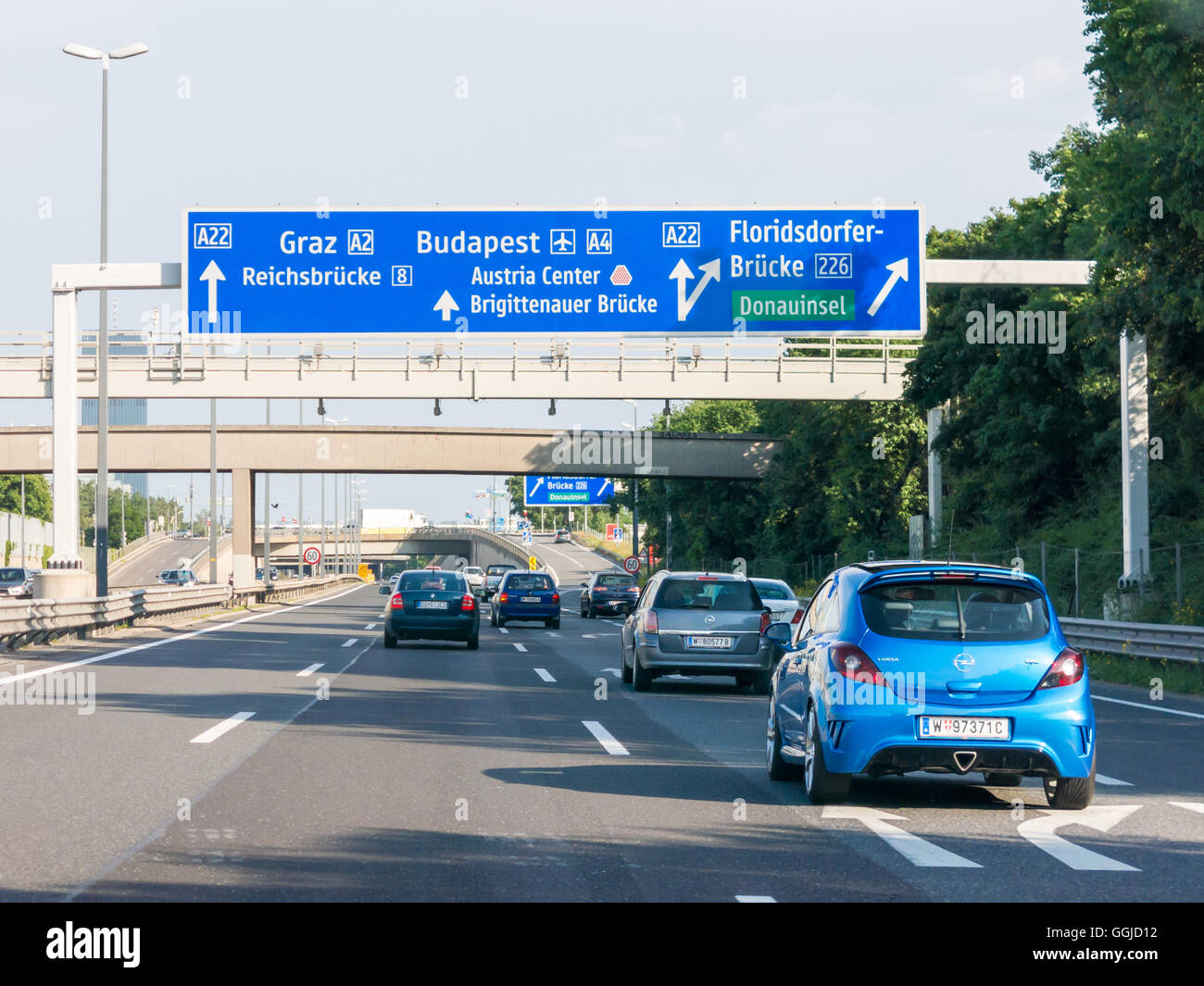 Traffic on highway Autobahn A22 and directional road signs in Vienna Stock Photo