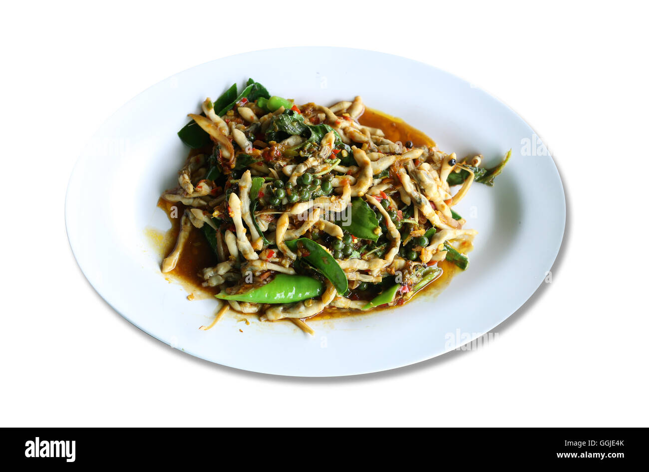 Spicy puff razor clams in the dish on white background,This is a local ...