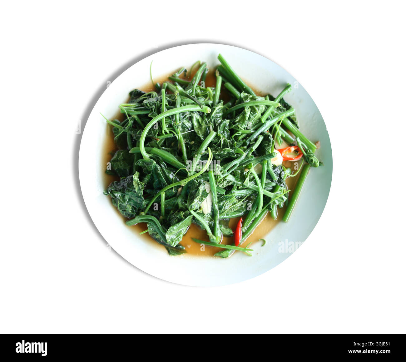 Tree top Bitter Cucumber or Balsum Pear of Puff in the dish on white background,This is a local Thai Foods. Stock Photo