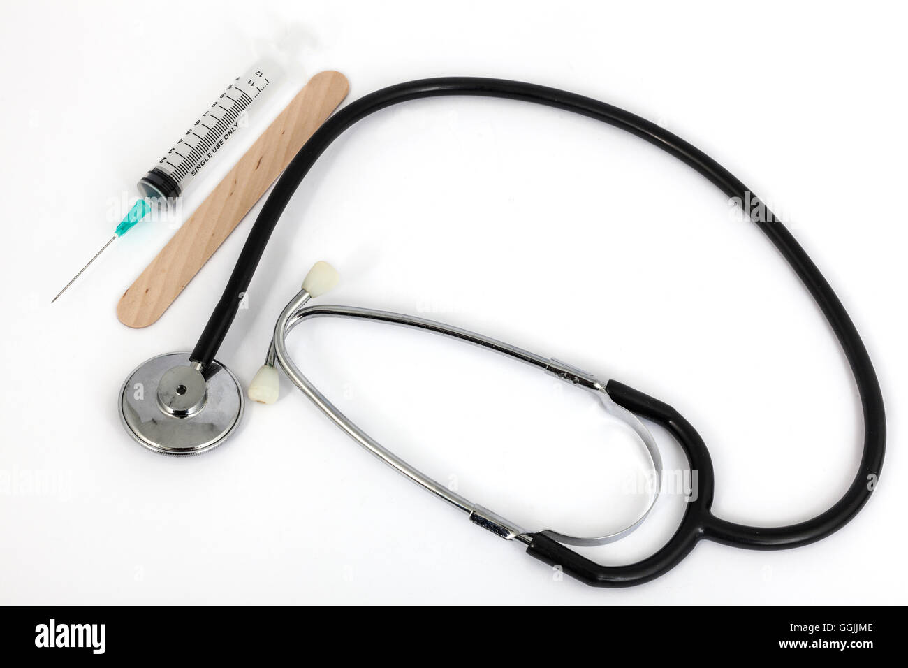 stethoscope and medical syringe with white background Stock Photo - Alamy