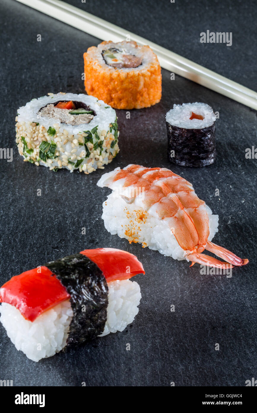 Sushi Maki Roll assortment chop sticks Stock Photo