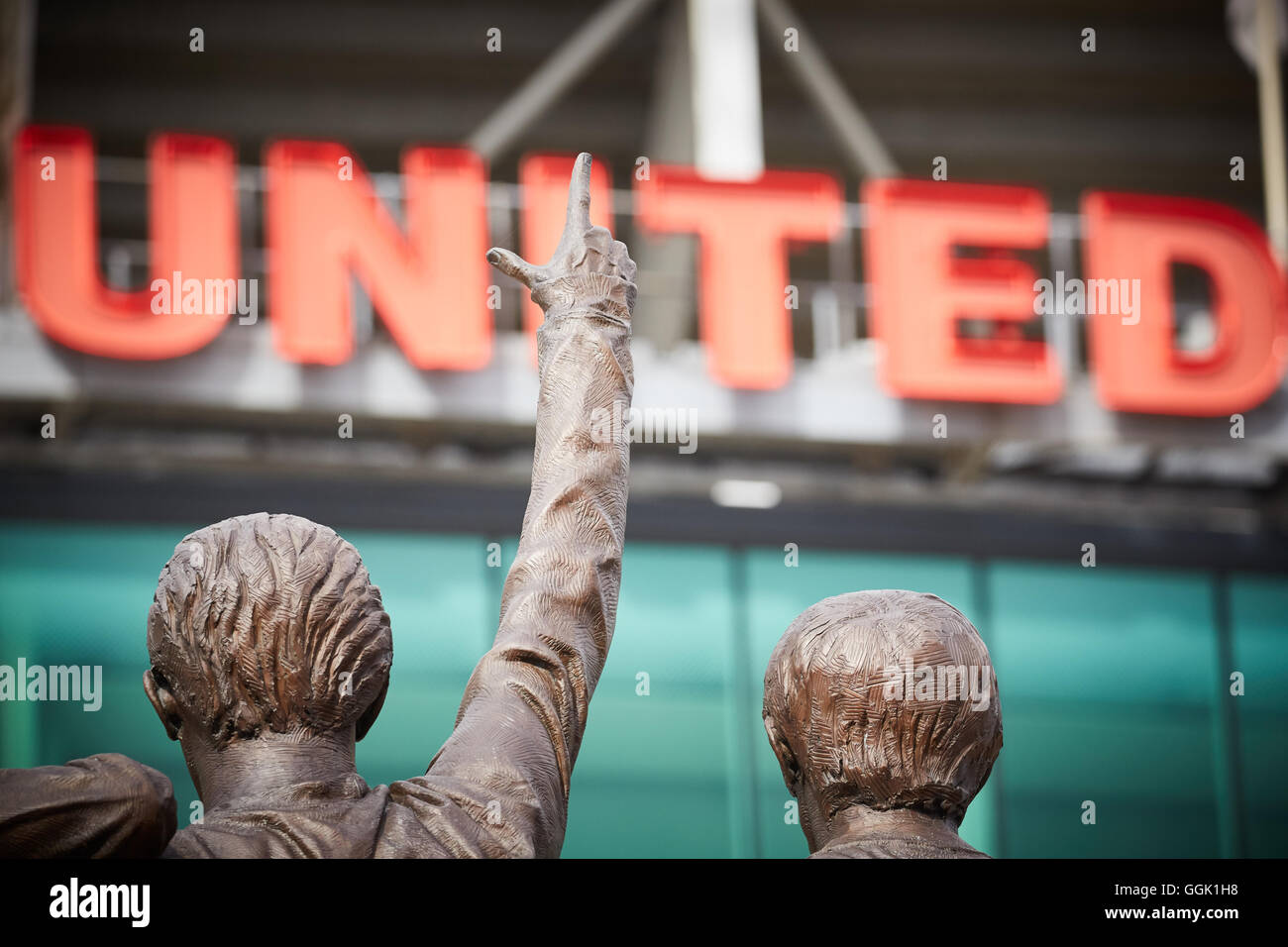 Manchester united  Holy Trinity Matt Busby statue   Artist creative designer designed created hand craft crafted made by sculpte Stock Photo