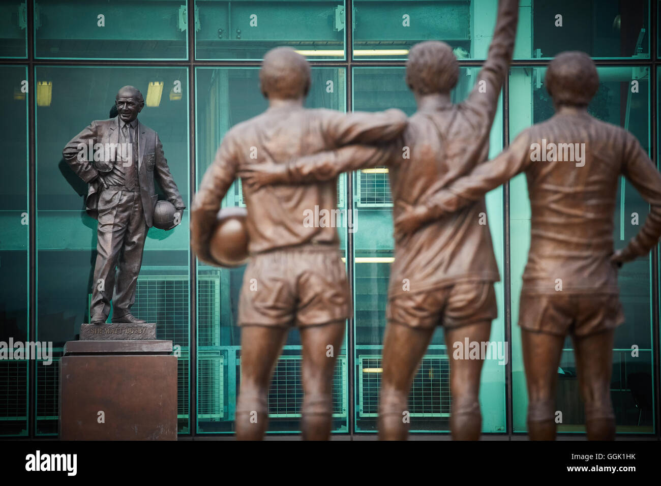 Manchester united  Holy Trinity Matt Busby statue   Artist creative designer designed created hand craft crafted made by sculpte Stock Photo