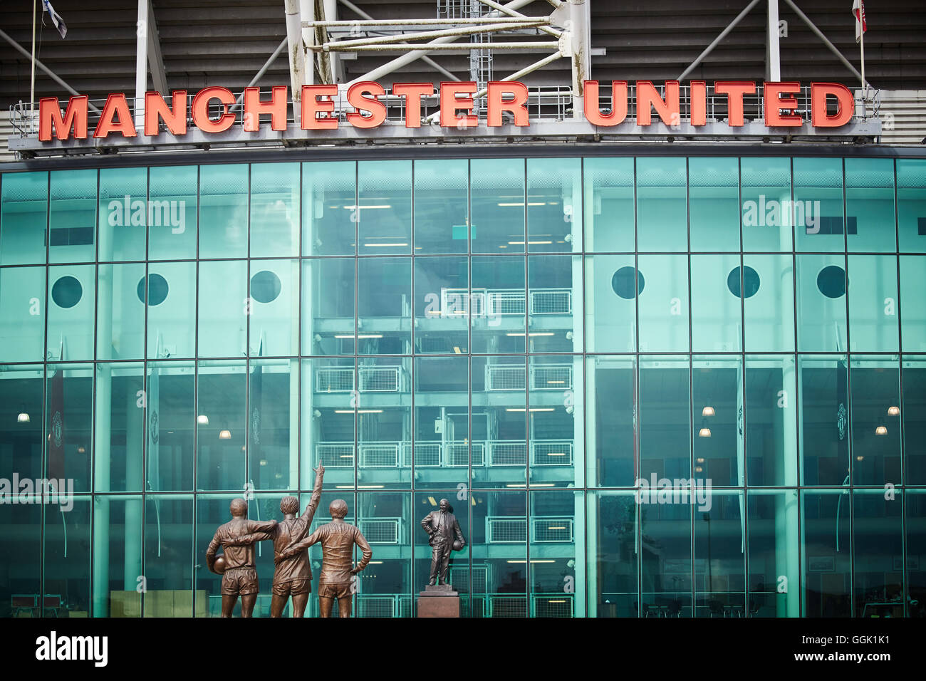 Manchester united  Holy Trinity Matt Busby statue   Artist creative designer designed created hand craft crafted made by sculpte Stock Photo