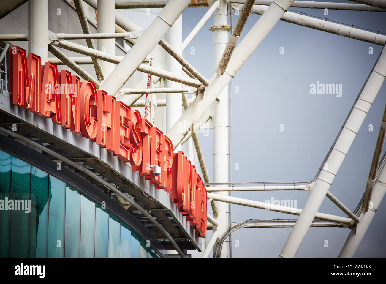 Manchester united sign old trafford   Sir Matt Busby Way sign neon on stadium design close up letters  outside Old Trafford copy Stock Photo