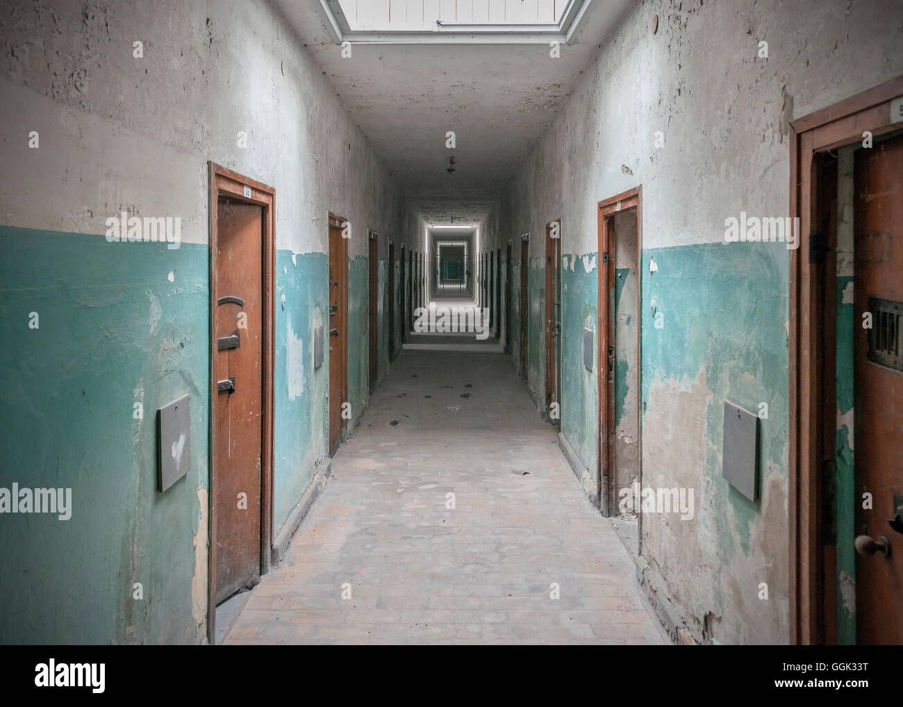 Corridor with prison cells at the concentration camp memorial Dachau, Upper Bavaria, Bavaria, Germany Stock Photo