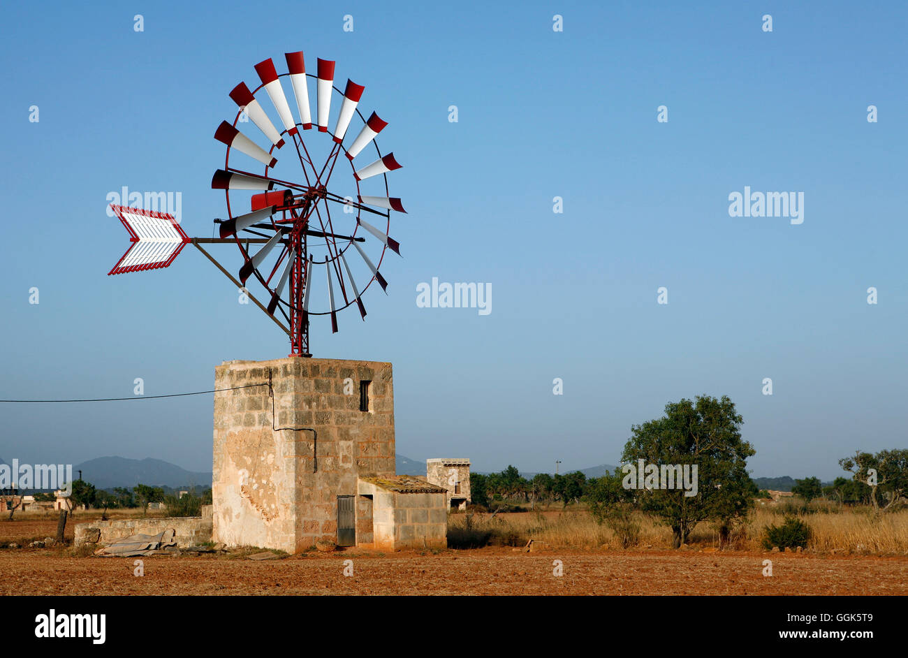Wind wheel on windmill with red and white rotor blades, Santanyi ...