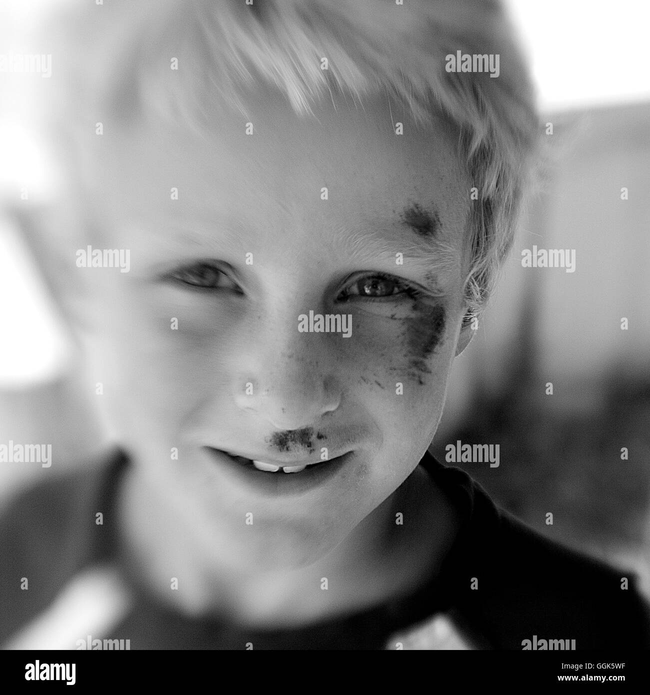 Scratched face of a boy (black and white photo using Lensbaby technique), Borden, Western Australia, Australia Stock Photo