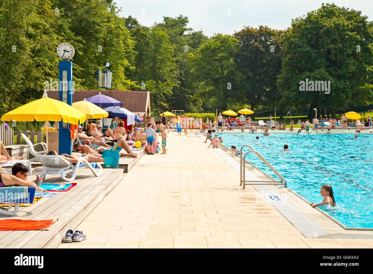 People Enjoying A Sunny Afternoon At The Outdoor Swimming Pool Heloponte Bad Wildungen Hesse 
