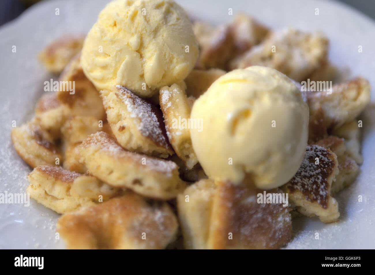 Shredded pancake, Kaiserschmarrn with vanilla ice-cream, Dessert, Food Stock Photo