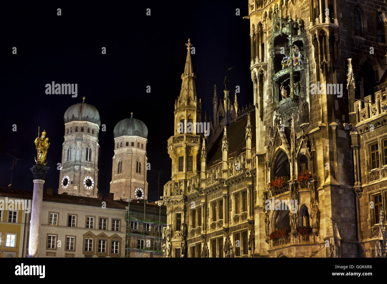 Munich Town Hall and the towers of the Frauenkirche at night, Munich, Bavaria, Germany Stock Photo