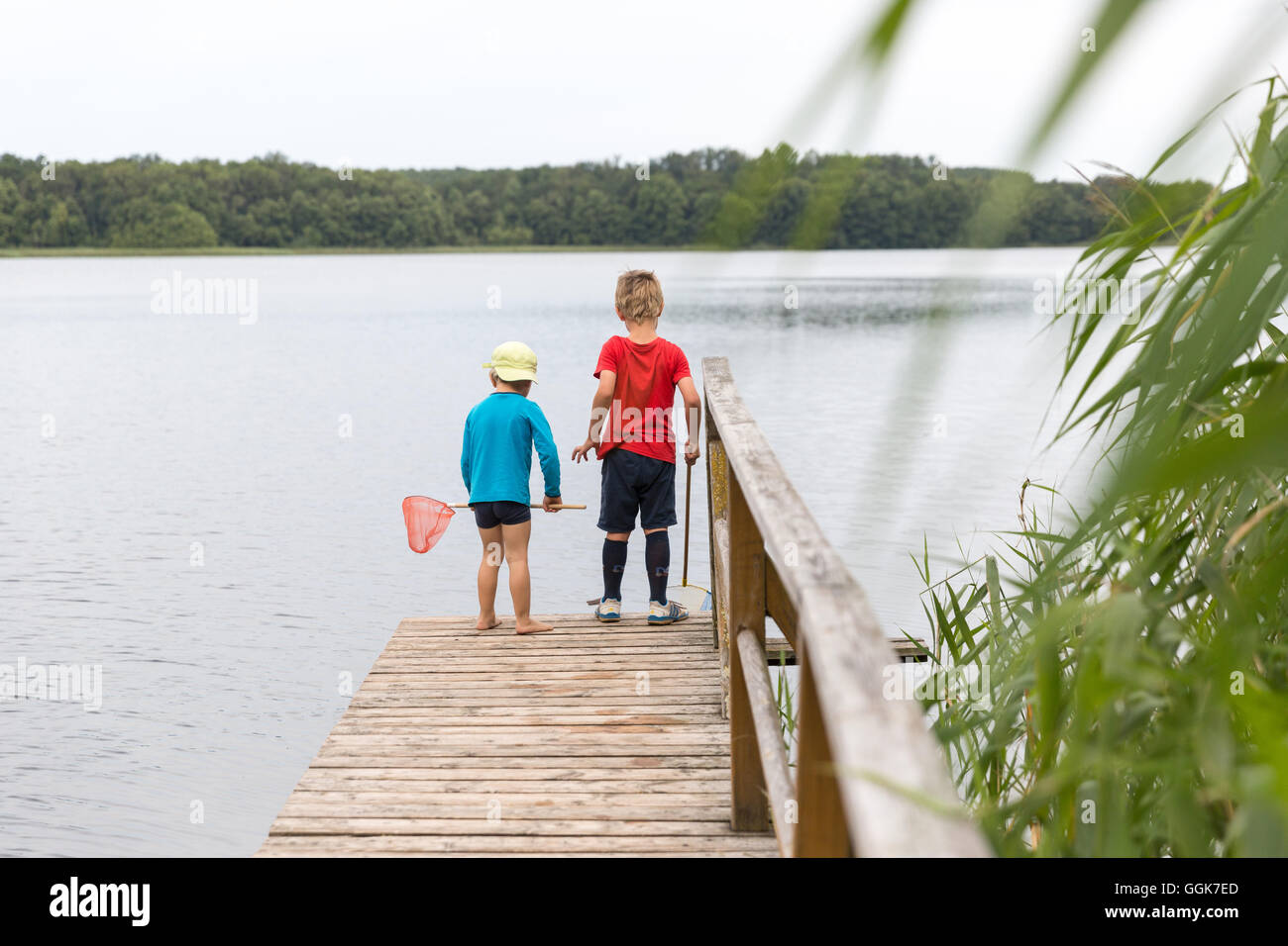 Two boys fishing hi-res stock photography and images - Alamy