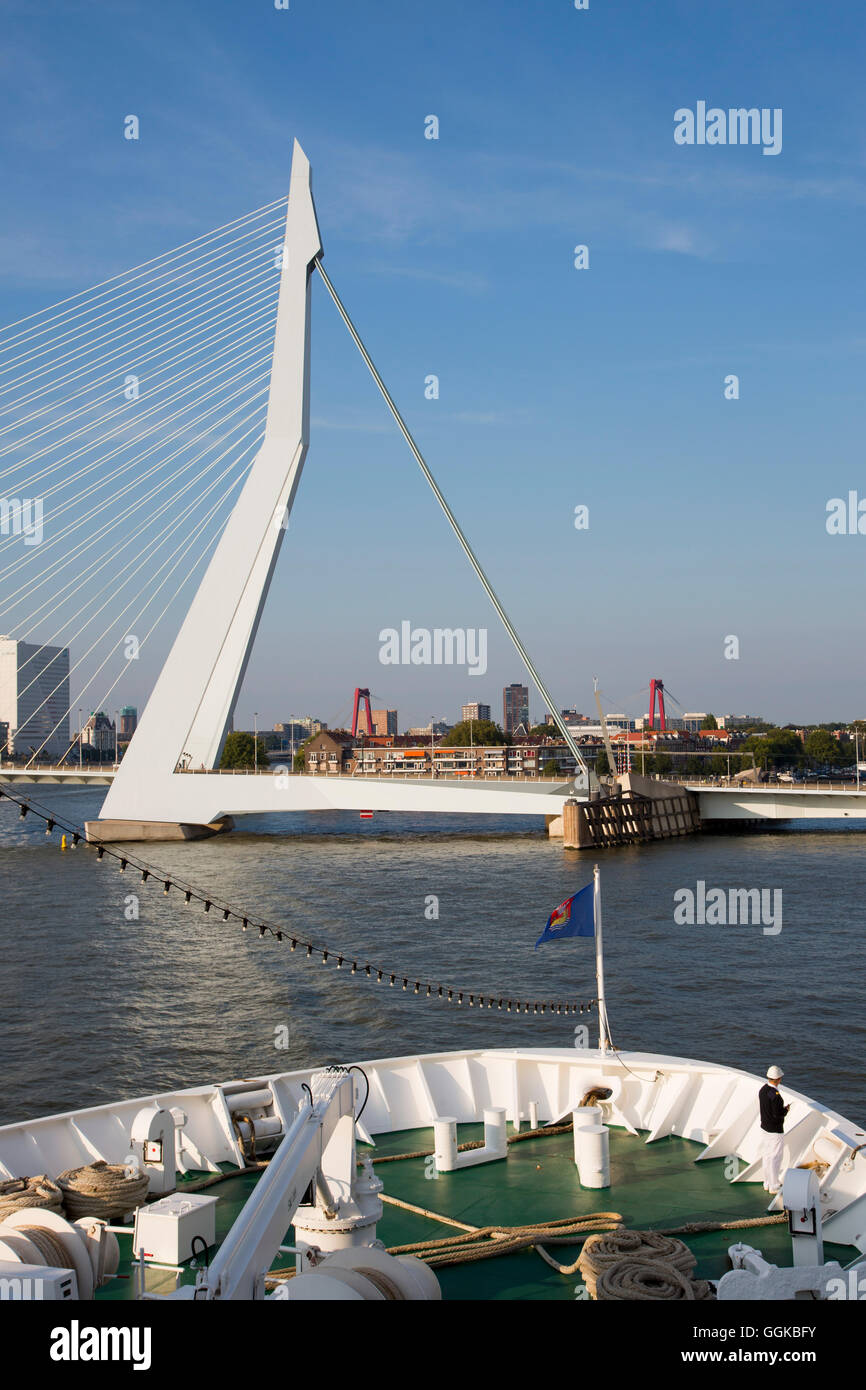 Bow of cruise ship MS Deutschland (Reederei Peter Deilmann) on Nieuwe Maas river with Erasmus Bridge, Rotterdam, South Holland, Stock Photo