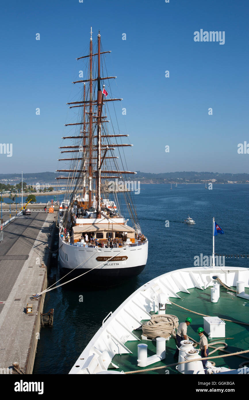 Bow of cruise ship MS Deutschland (Reederei Peter Deilmann) and sailing cruise ship Sea Cloud II (Sea Cloud Cruises) at the pier Stock Photo