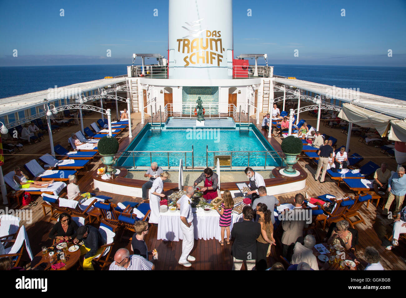 Oysters being served during a celebration on the pool deck of cruise ship MS Deutschland (Reederei Peter Deilmann), Atlantic Oce Stock Photo