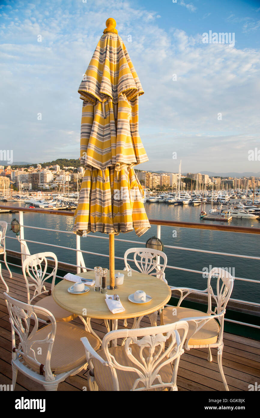 Sunshade and tables of the Lido Cafe aboard cruise ship MS Deutschland (Reederei Peter Deilmann), Palma, Mallorca, Balearic Isla Stock Photo