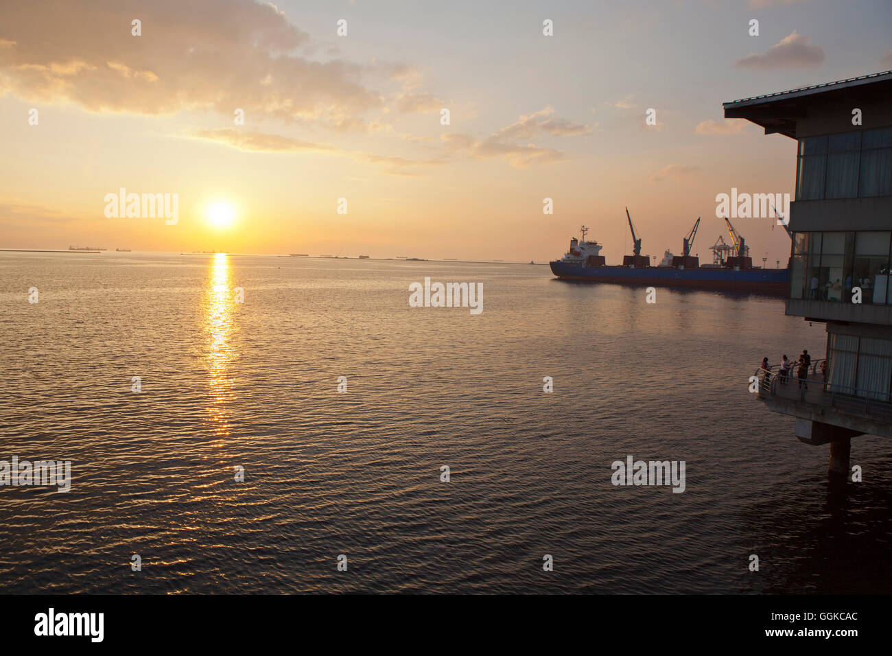 Sunset in the harbour of Metro Manila, capital of the Philippines, Asia Stock Photo