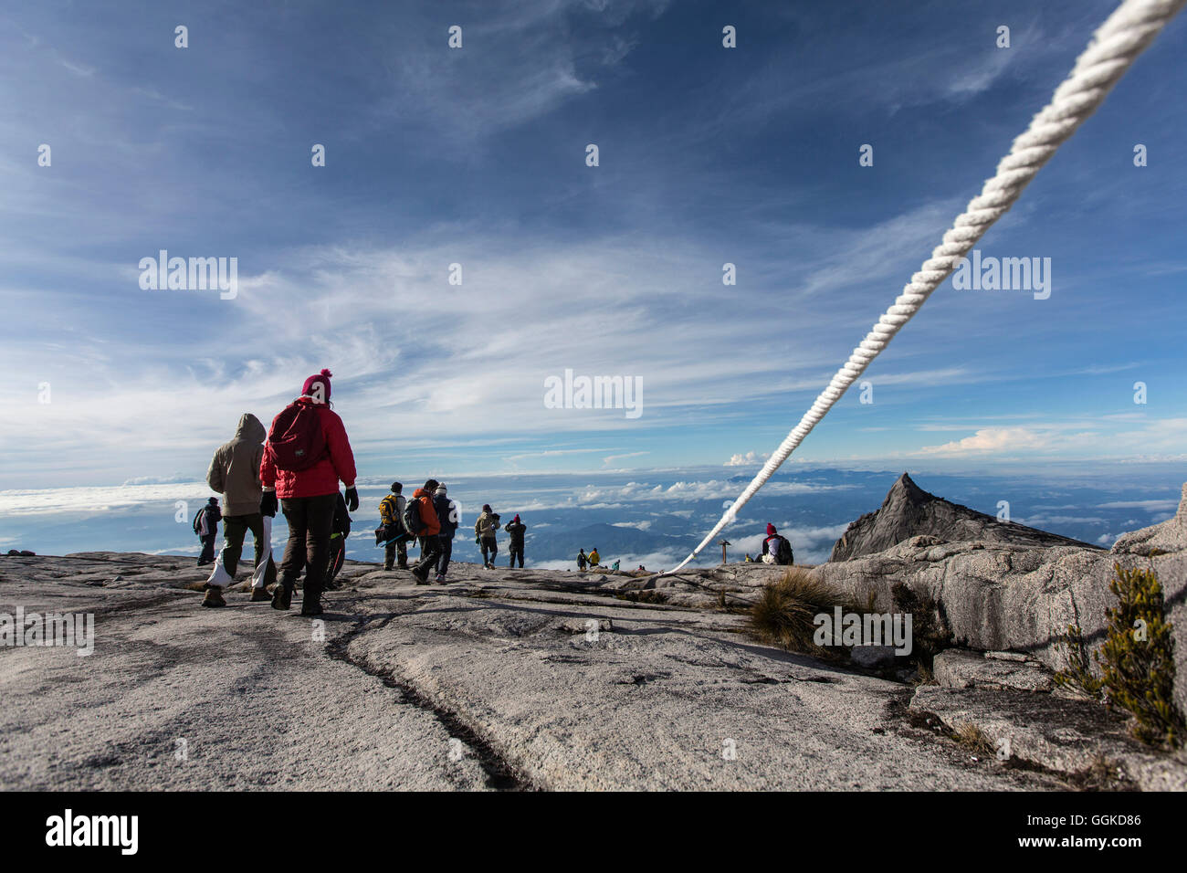 Mountain Tourists climbing down from the Low's Peak 4091 m, Mount ...